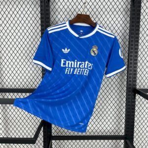Camiseta tercera Real Madrid 2025‑26 azul con detalles en blanco, escudo retro y trébol de adidas Originals