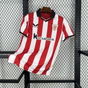 Camiseta local Athletic Club 2025‑26 con rayas rojas y blancas, cuello de piqué negro y detalles retro