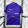 Parte trasera camiseta visitante Real Madrid 1994-96 Adidas morada con detalles en blanco y espacio para nombre y número personalizados