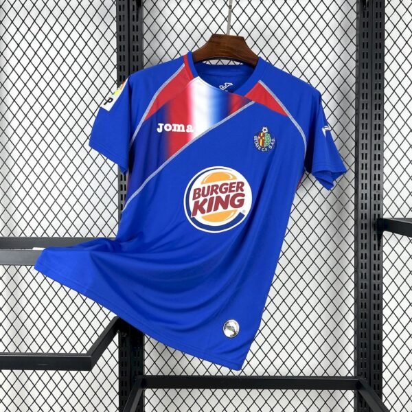Camiseta local Getafe CF 2009-10 Joma color azul con detalles en rojo y blanco, patrocinador Burger King