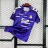 Camiseta visitante Real Madrid 1994-96 Adidas color morado con detalles en blanco y patrocinador Teka