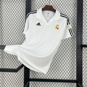 Camiseta local Real Madrid 2001-02 Adidas color blanco sin patrocinador con franjas negras en los hombros y escudo bordado