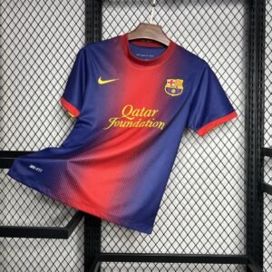 Camiseta local FC Barcelona 2012-13 Nike con diseño azulgrana y patrocinador Qatar Foundation